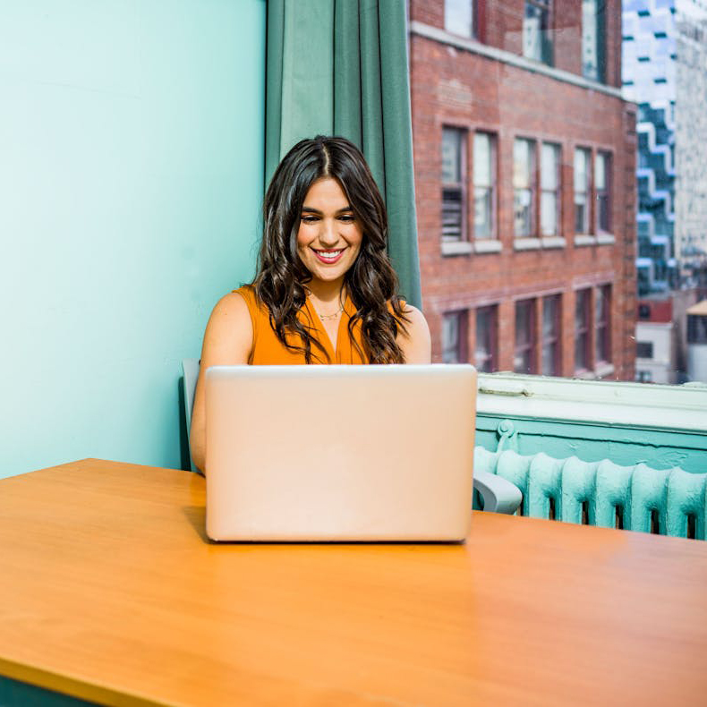 Therapist speaking with a client online